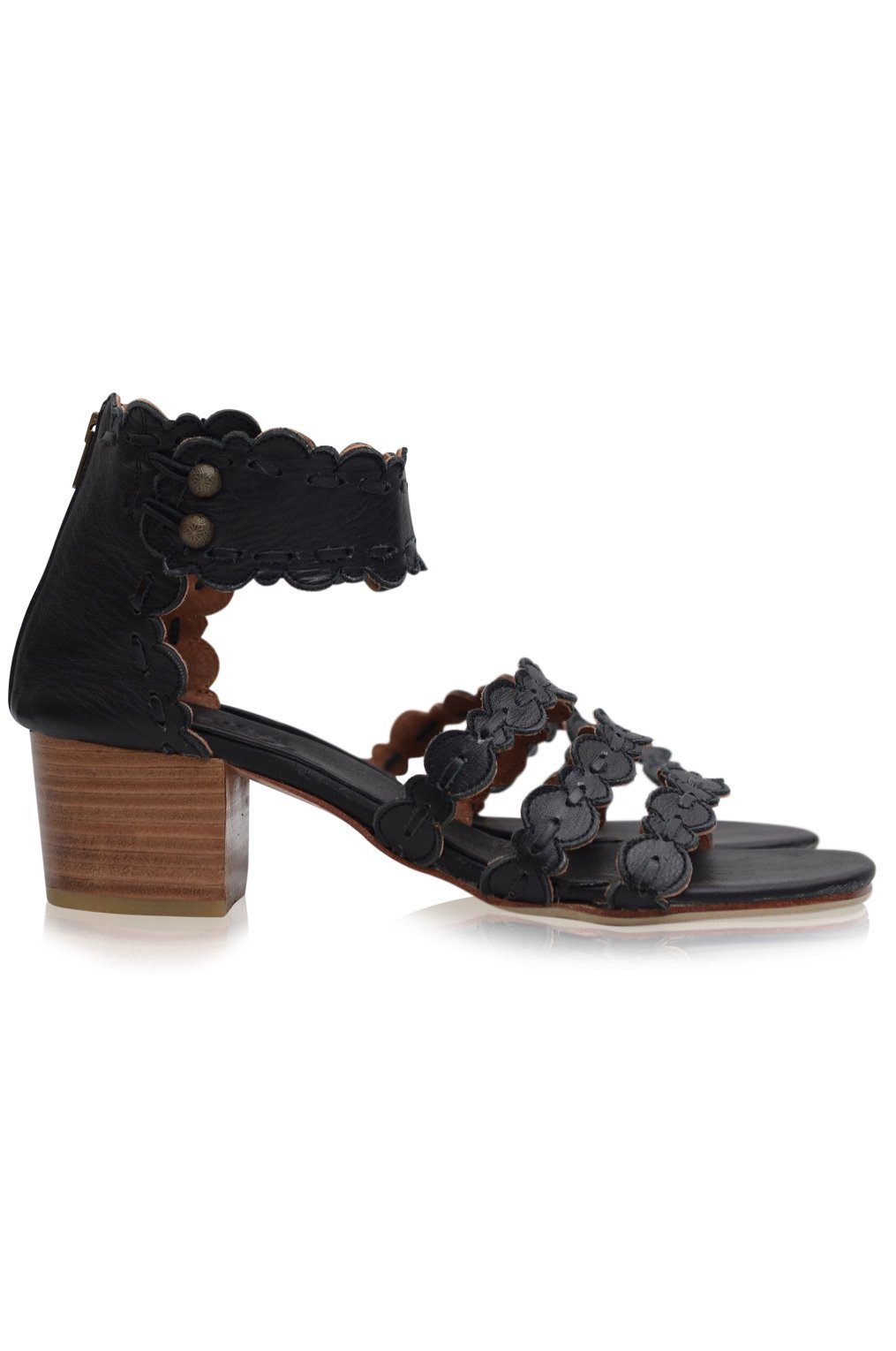 Black sandal with floral details and wooden heel on a white background