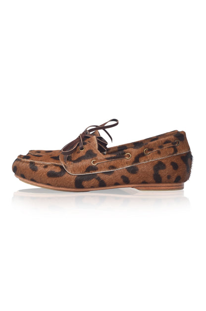 Leopard print boat shoe on a white background
