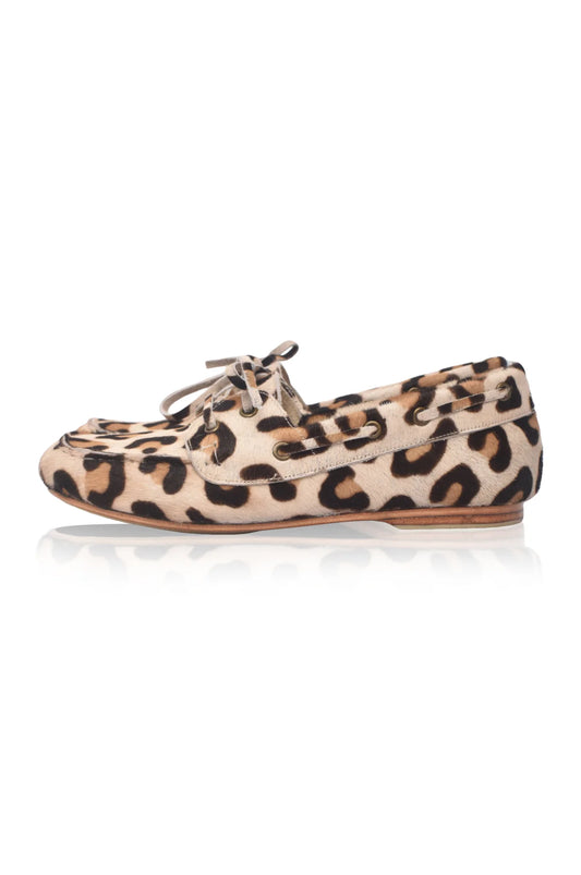 Leopard print flat shoe on a white background
